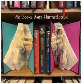 Quirky Stick Men book ends made from hand-folded vintage book pages, showcasing unique designs and craftsmanship.