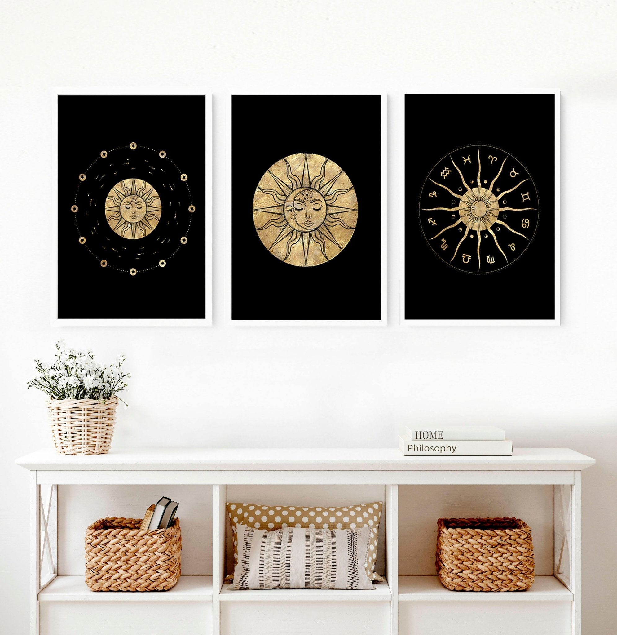 Set of three framed wall art prints featuring intricate sun and moon designs in a radiant gold finish, perfect for bohemian decor.