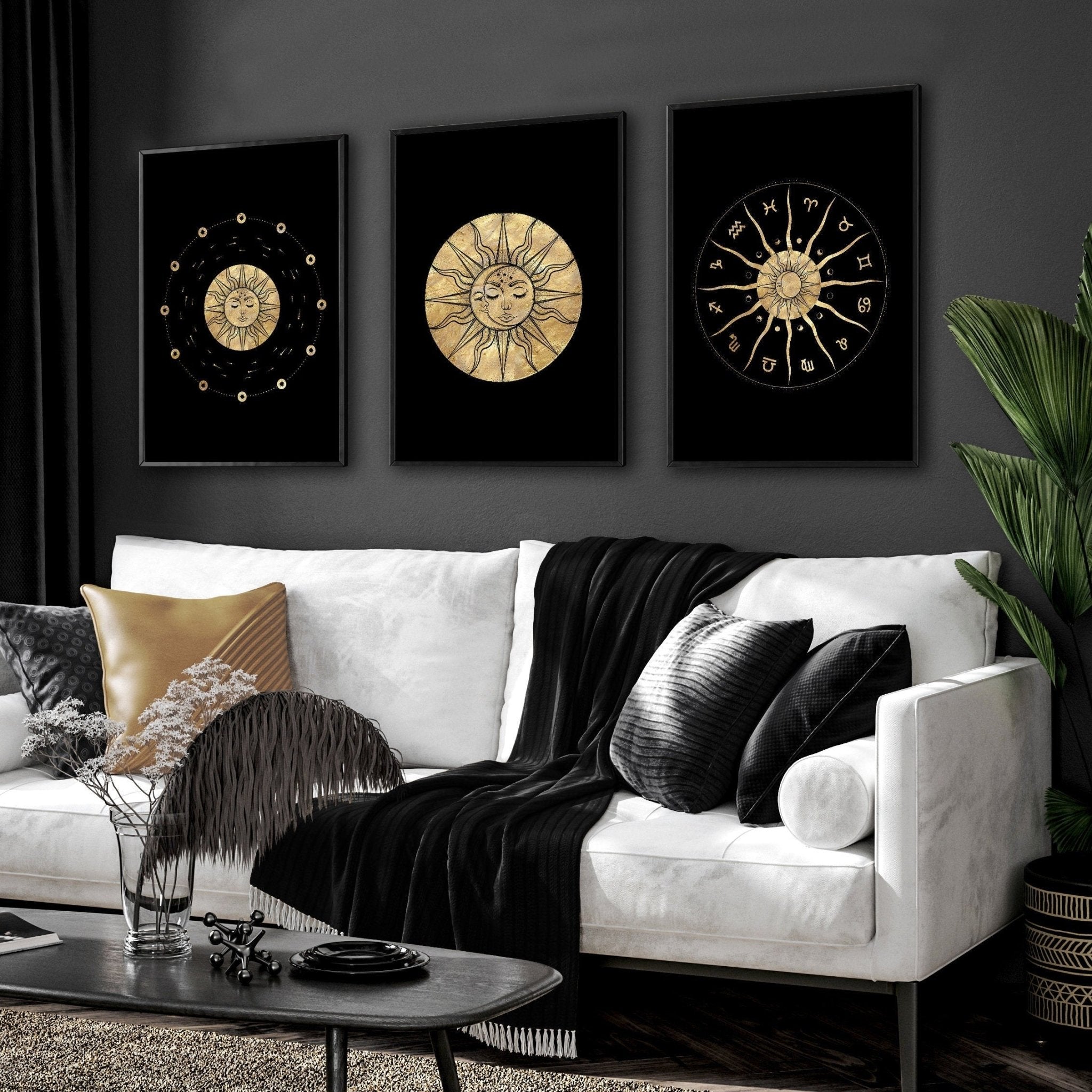 Set of three framed wall art prints featuring intricate sun and moon designs in a radiant gold finish, perfect for bohemian decor.