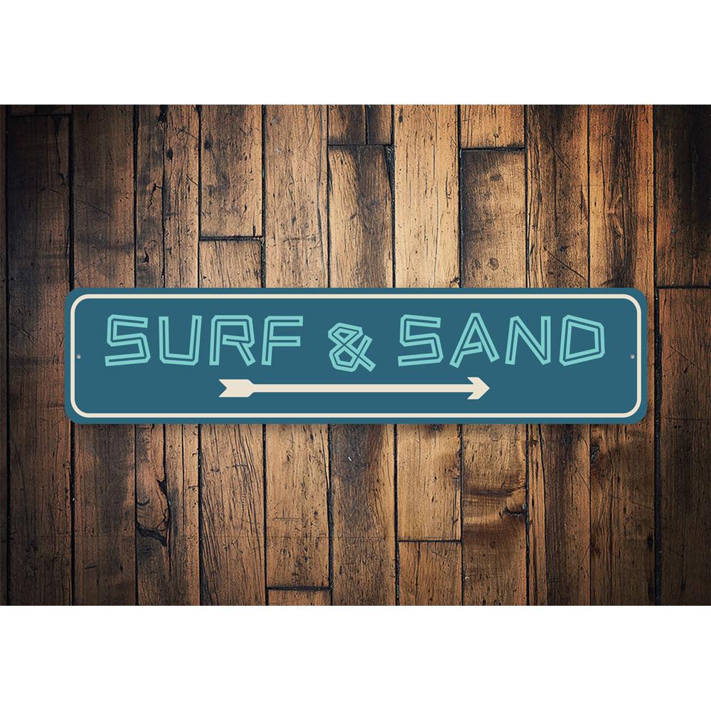 Surf And Sand Sign made of quality aluminum, featuring vibrant beach-themed design, perfect for home decor.