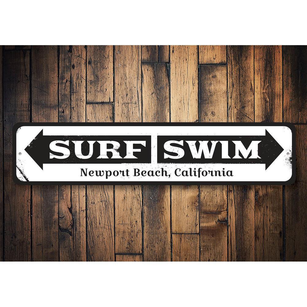 Surf Swim Arrow Sign made of high-quality aluminum, featuring a beach-themed design perfect for coastal decor.