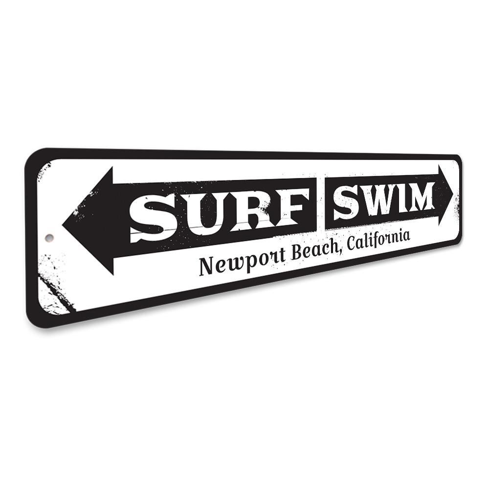 Surf Swim Arrow Sign made of high-quality aluminum, featuring a beach-themed design perfect for coastal decor.