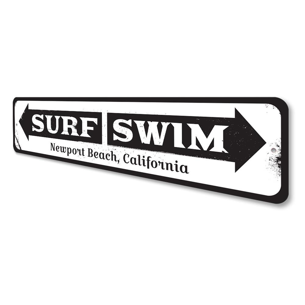 Surf Swim Arrow Sign made of high-quality aluminum, featuring a beach-themed design perfect for coastal decor.