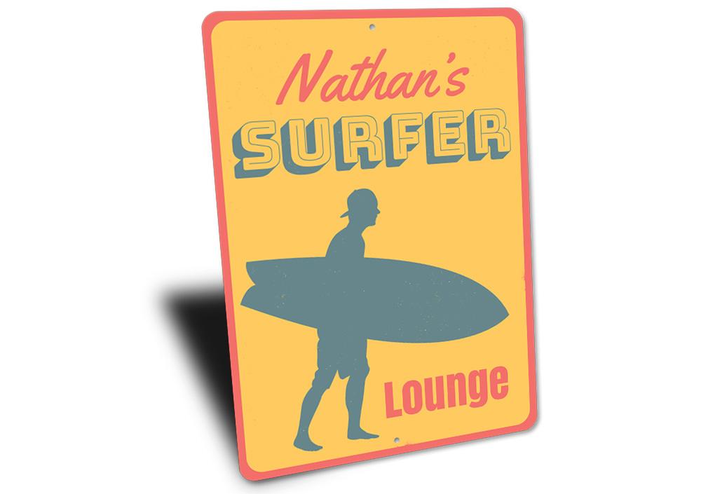 A decorative Surfer Lounge Sign made of high-quality aluminum, featuring a beach-themed design perfect for coastal decor.