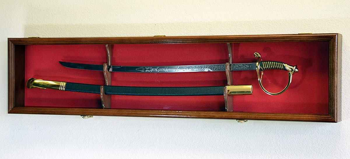 Cherry solid sword display case cabinet with felt background, showcasing a sword and scabbard, featuring brass hinges and a matching sword stand.