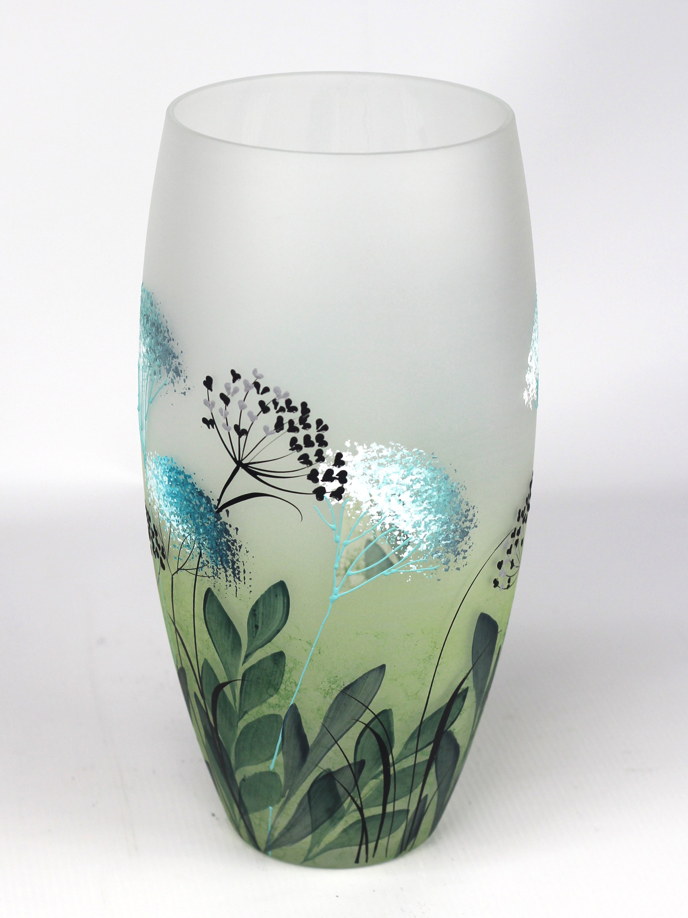 A beautifully hand-painted green decorative glass vase with intricate designs, showcasing unique artistry and craftsmanship.