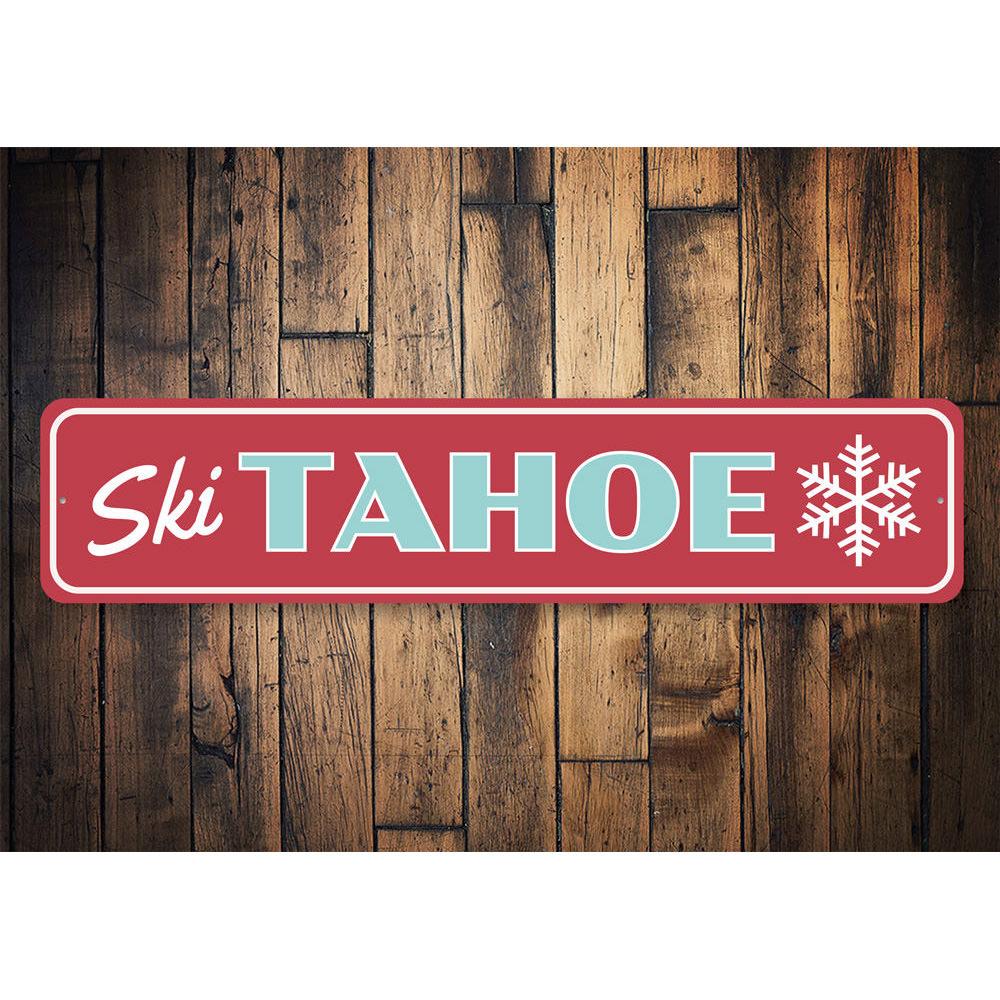 Tahoe Skiing Sign made of high-quality aluminum, featuring a ski lodge theme with vibrant colors, perfect for wall decor.