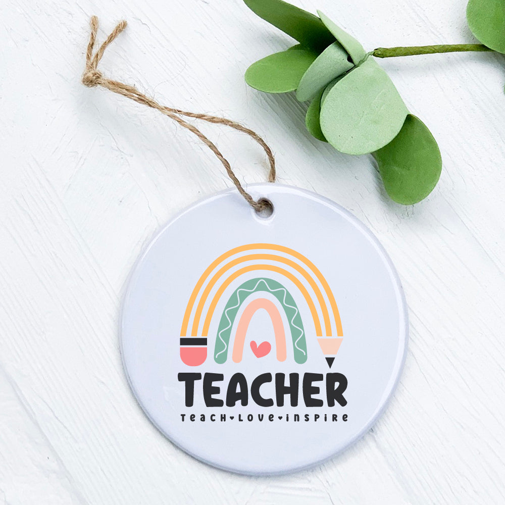 A beautifully crafted porcelain Teacher Rainbow Ornament featuring vibrant colors and a smooth glossy finish, perfect for gifts or home decor.