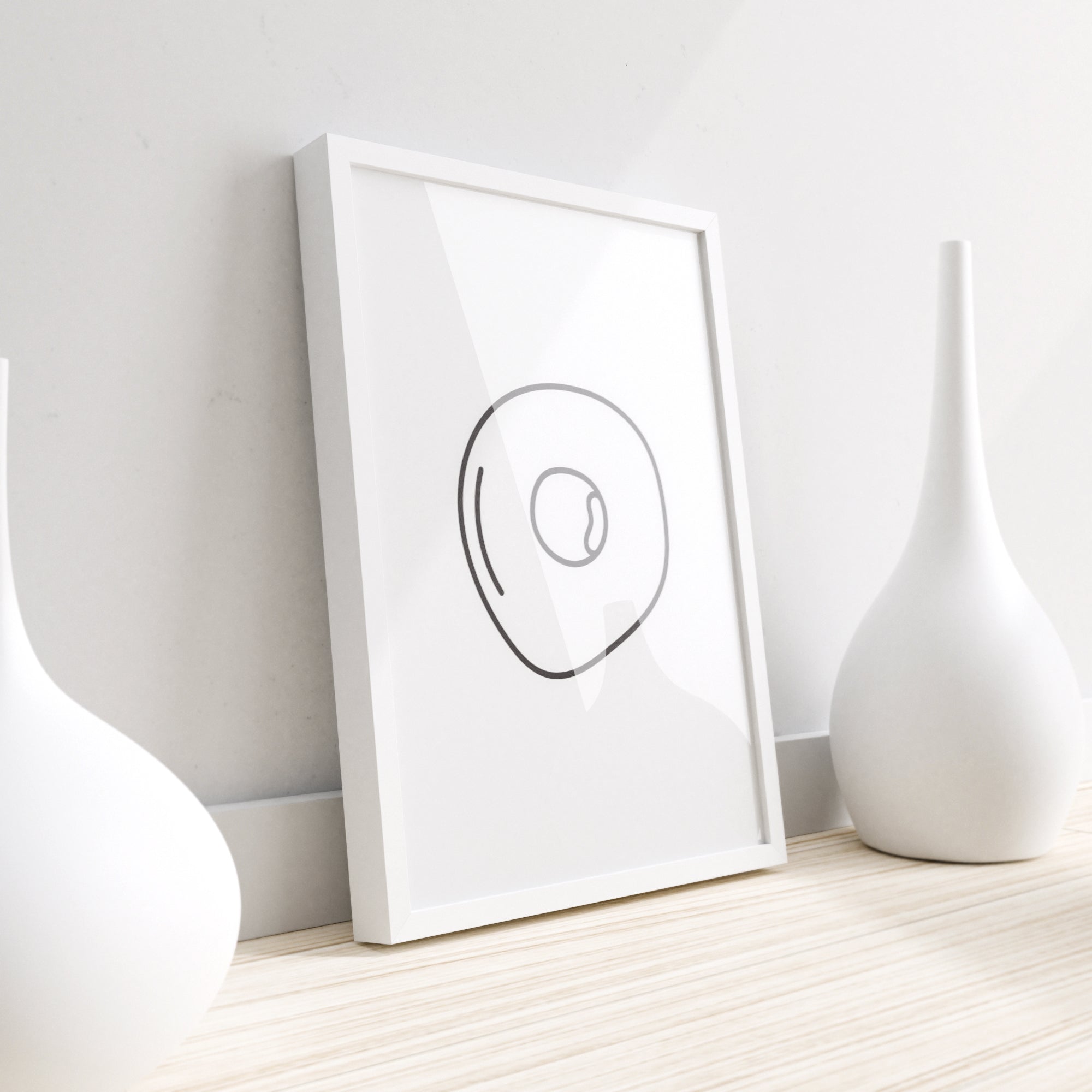 A vibrant wall print featuring a fried egg design, perfect for kitchen decor.