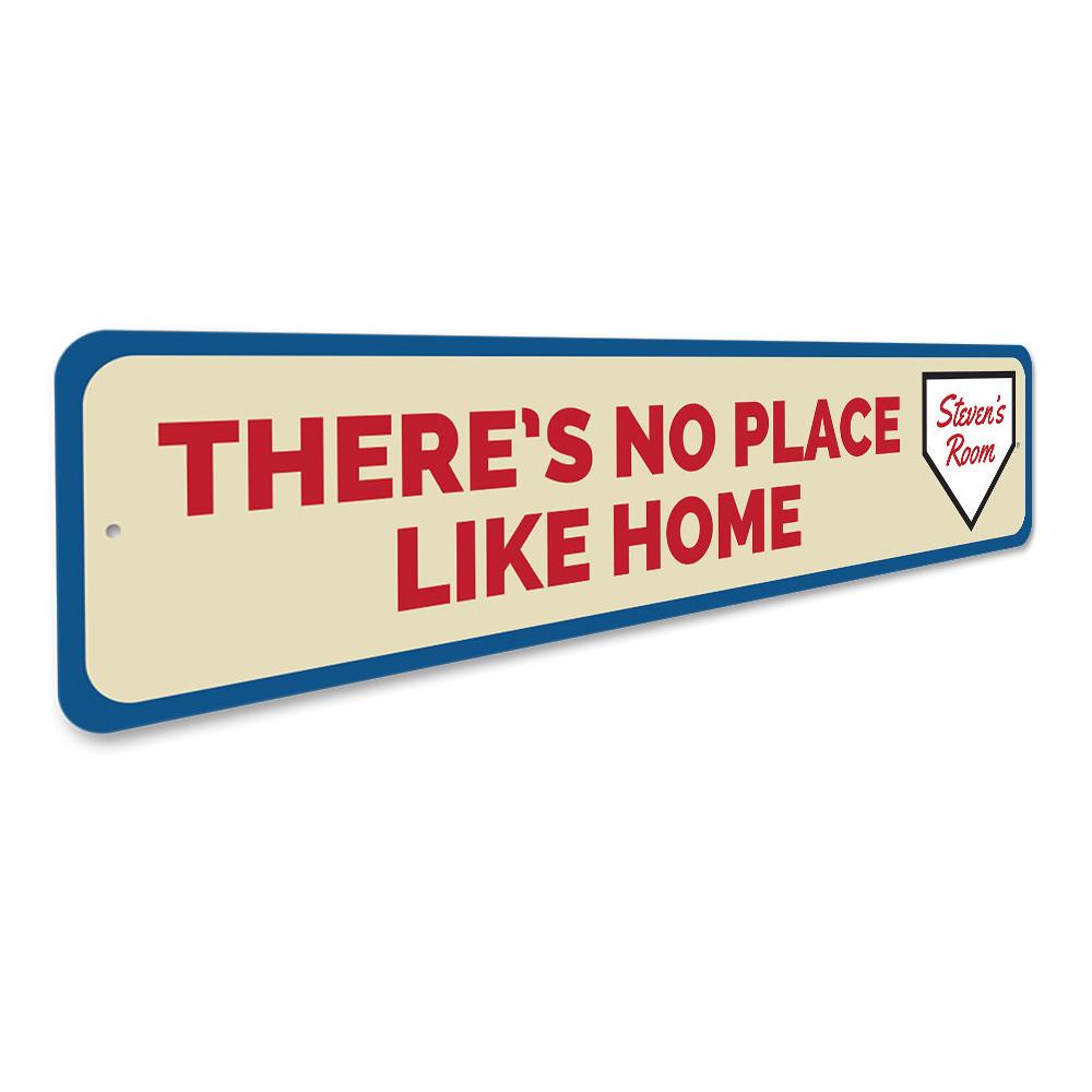 A decorative metal sign reading 'There's No Place Like Home', showcasing a stylish design suitable for various rooms.