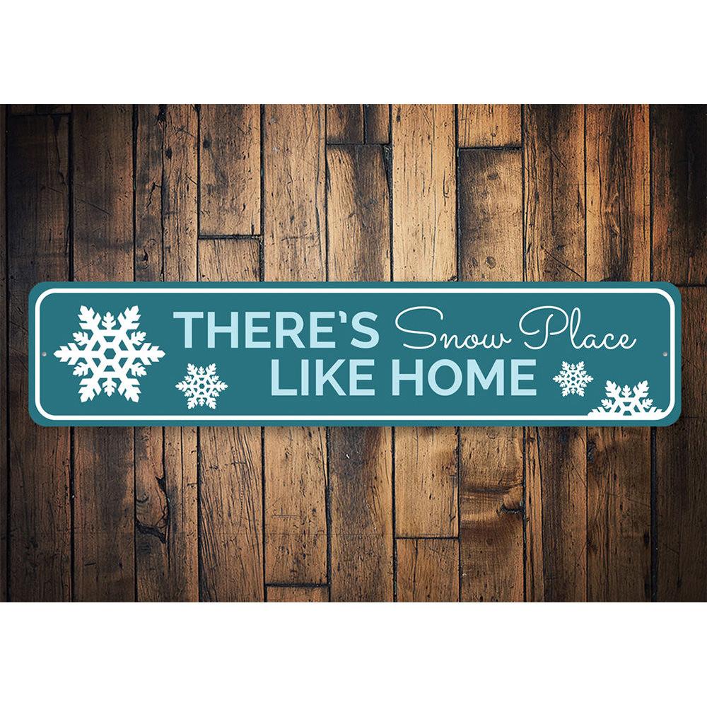 A festive holiday sign reading 'There's Snow Place Like Home', crafted from high-quality aluminum, showcasing a charming design perfect for Christmas decor.