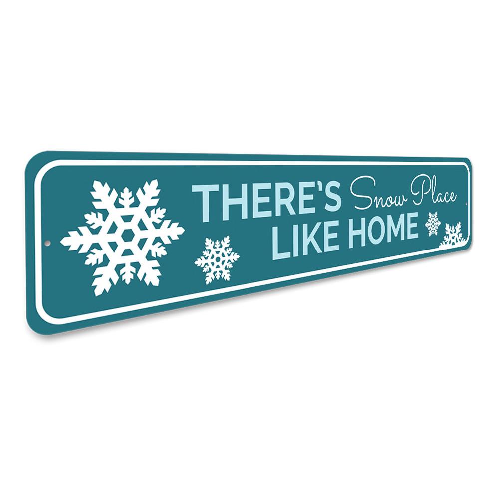 A festive holiday sign reading 'There's Snow Place Like Home', crafted from high-quality aluminum, showcasing a charming design perfect for Christmas decor.