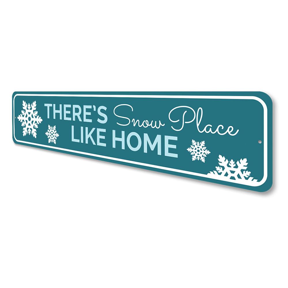 A festive holiday sign reading 'There's Snow Place Like Home', crafted from high-quality aluminum, showcasing a charming design perfect for Christmas decor.