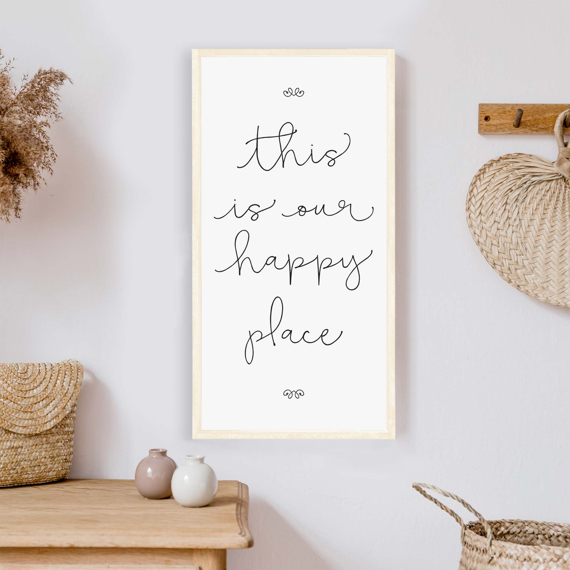 A charming wood sign reading 'This Is Our Happy Place' with a whimsical font, framed in stained pine wood, perfect for home decor.