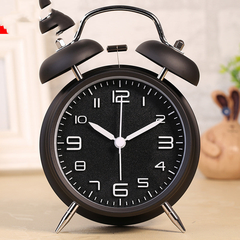 Three-dimensional digital alarm clock with a round design, luminous display, and metal shell, perfect for stylish home decor.