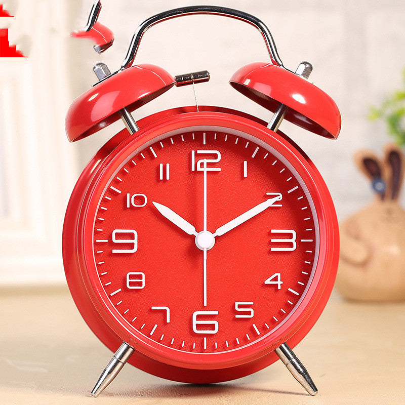 Three-dimensional digital alarm clock with a round design, luminous display, and metal shell, perfect for stylish home decor.