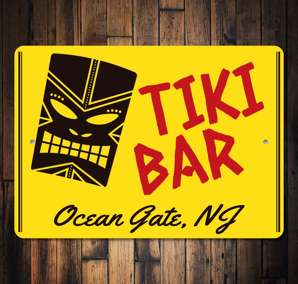 Colorful Tiki Head Sign made of aluminum, featuring intricate designs and vibrant colors, perfect for wall decoration.