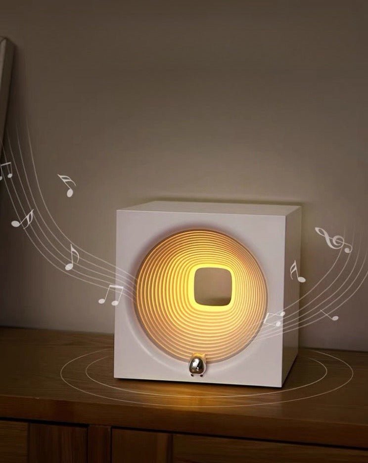 Time Machine Sleep Inducing Bedside Lamp with a futuristic design, featuring a soft glow and built-in speaker for soothing sounds.