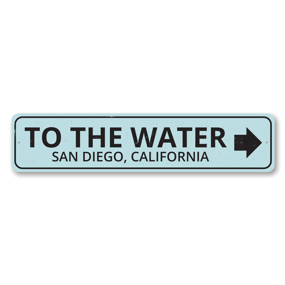 To the Water Arrow Sign made of high-quality aluminum, featuring a coastal design perfect for beach houses and outdoor decor.