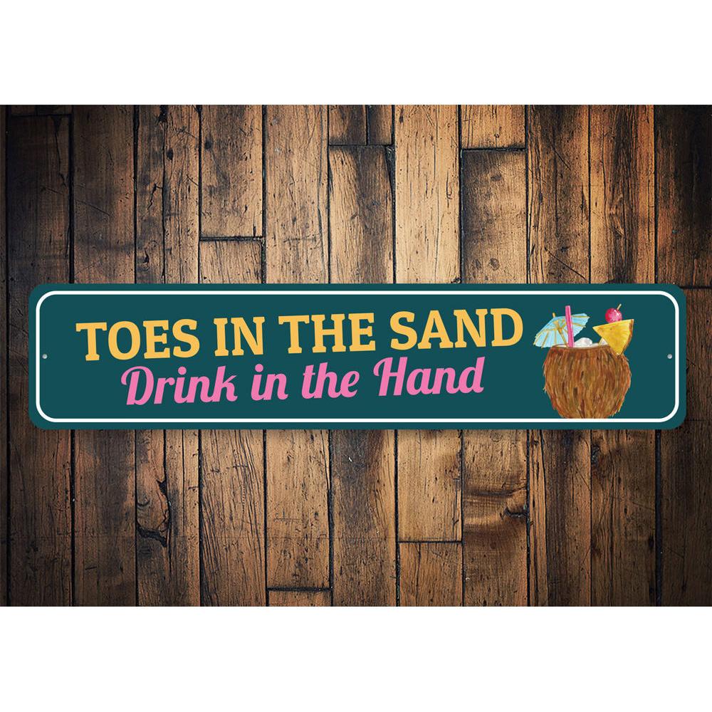 Toes in the Sand Sign featuring beach-themed design, made from high-quality aluminum, perfect for coastal decor.
