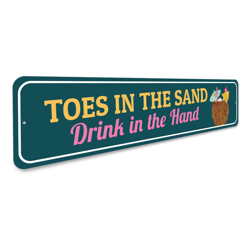 Toes in the Sand Sign featuring beach-themed design, made from high-quality aluminum, perfect for coastal decor.