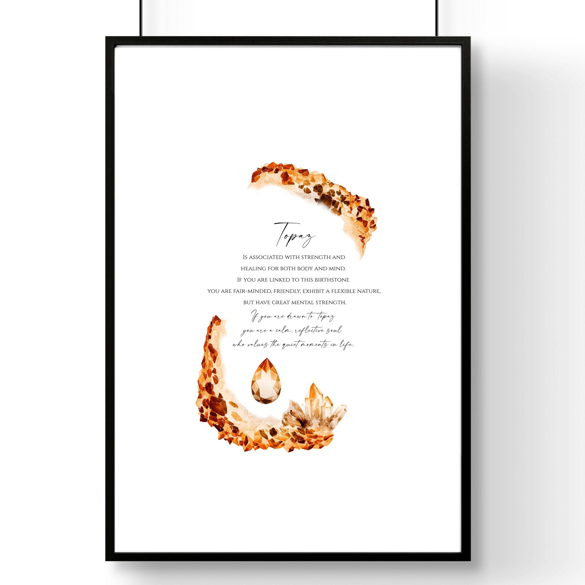Framed wall art print featuring the Topaz birthstone in warm golden-brown hues, showcasing its shimmering facets and radiant glow.