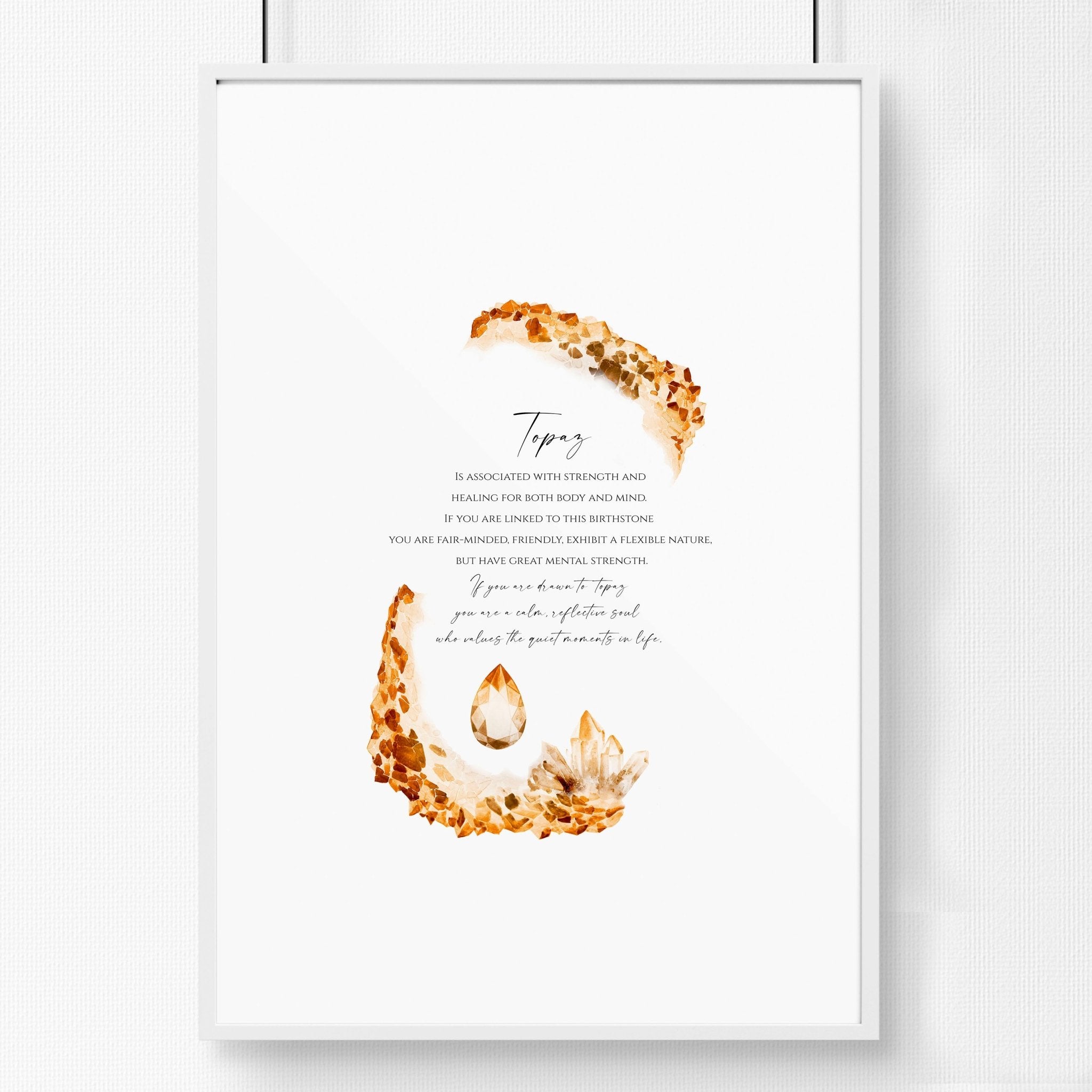 Framed wall art print featuring the Topaz birthstone in warm golden-brown hues, showcasing its shimmering facets and radiant glow.