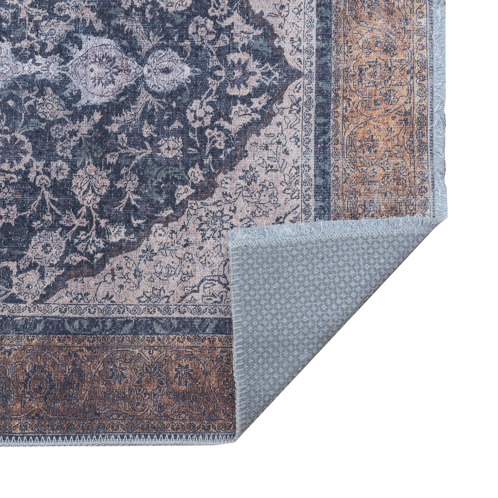 Topkapi Rug featuring classic medallion design in vibrant Anatolian spice hues of orange and brown, perfect for indoor spaces.