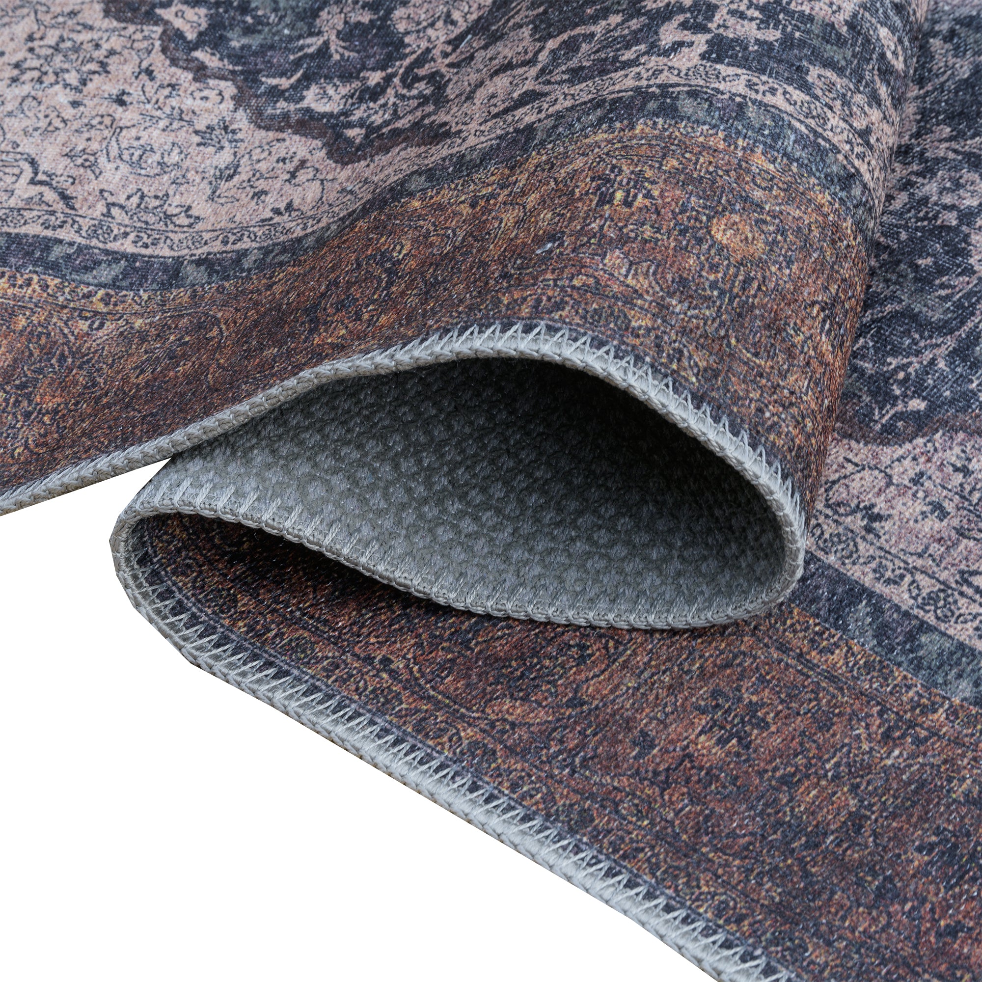 Topkapi Rug featuring classic medallion design in vibrant Anatolian spice hues of orange and brown, perfect for indoor spaces.