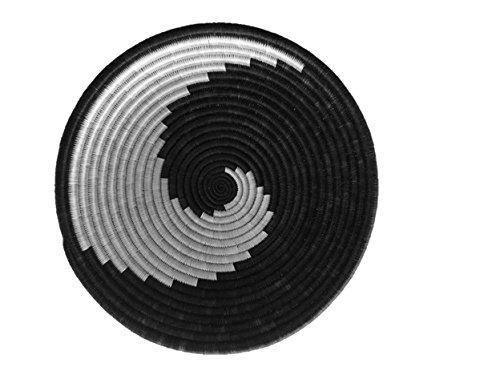 Traditional African Coiled Raffia Basket showcasing vibrant colors and intricate patterns, perfect for wall display or tabletop use.