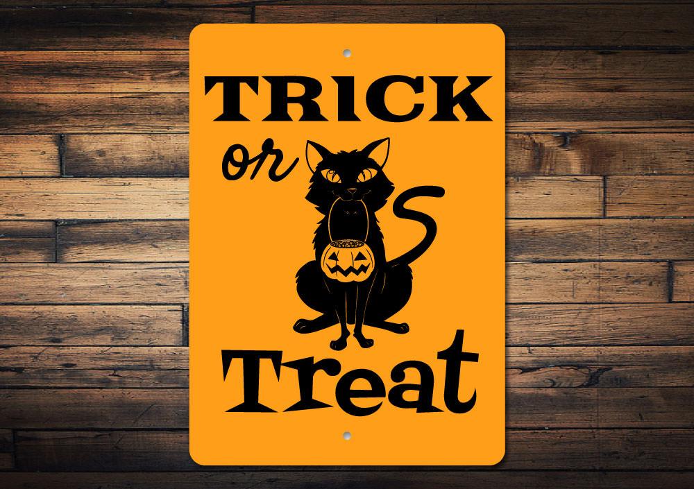 A decorative Trick Or Treat Sign made of high-quality aluminum, featuring spooky Halloween-themed graphics, perfect for home decor.