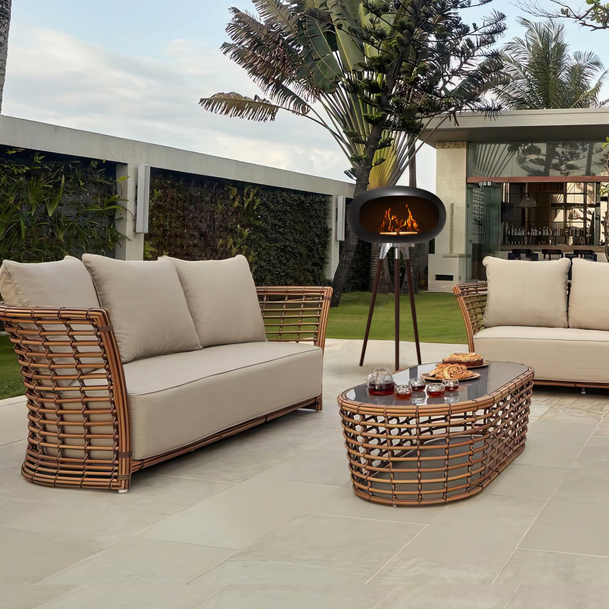 Tripod Indoor + Outdoor Ethanol Fireplace featuring wooden legs and a metal dome, providing a cozy ambiance.