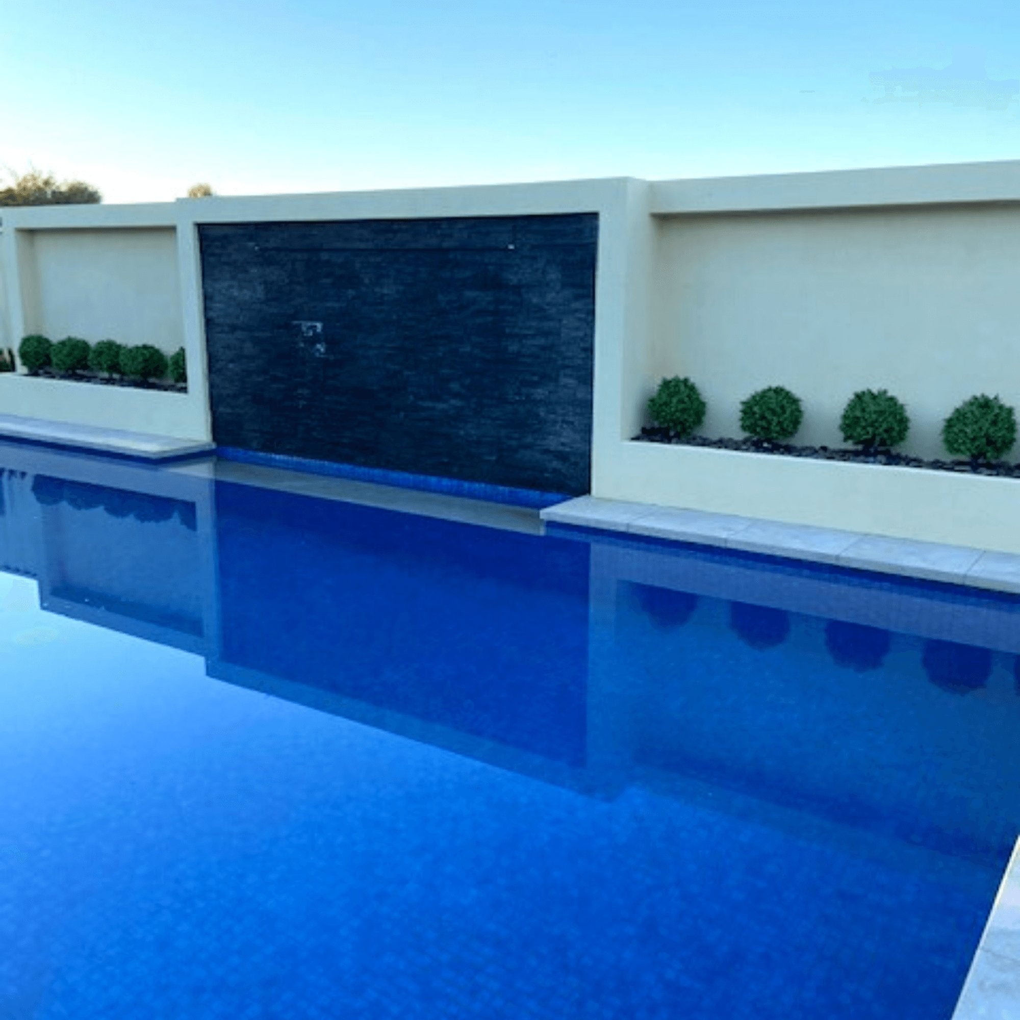 UV Resistant Artificial Topiary Shrub (Hedyotis) 50CM in Mixed Green with vibrant two-tone leaves in a plastic pot.