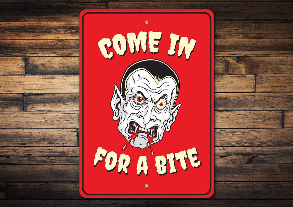 A spooky Vampire Halloween Sign made of aluminum, featuring eerie graphics and customizable text, perfect for Halloween decor.