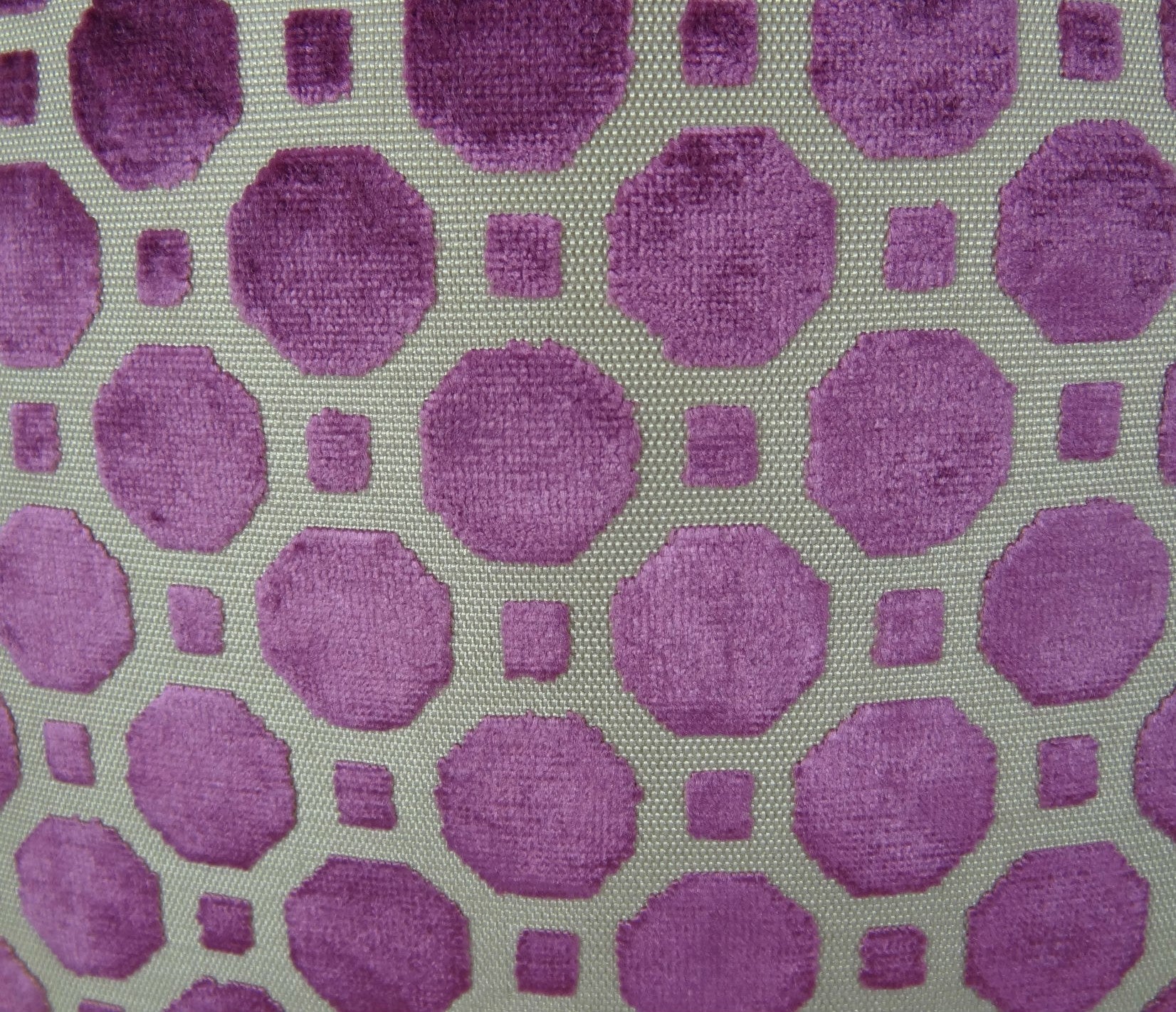 Luxurious handmade pillow in velvet plum magenta and taupe with geometric pattern, featuring an invisible zipper and double-sided design.