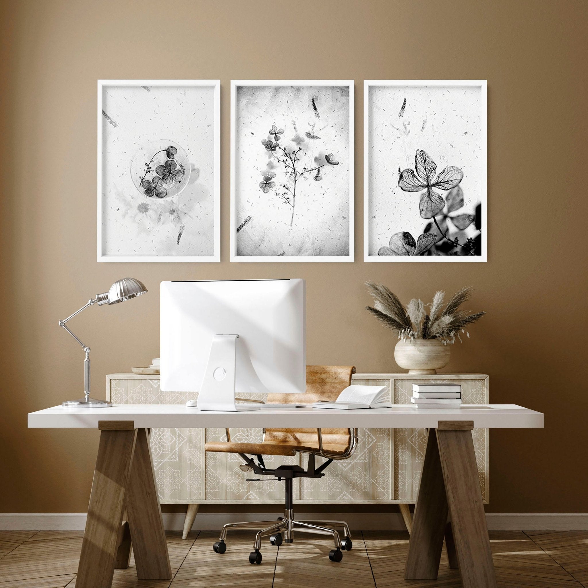 Set of 3 framed wall art prints featuring Black and White Botanical designs, perfect for home office decor.
