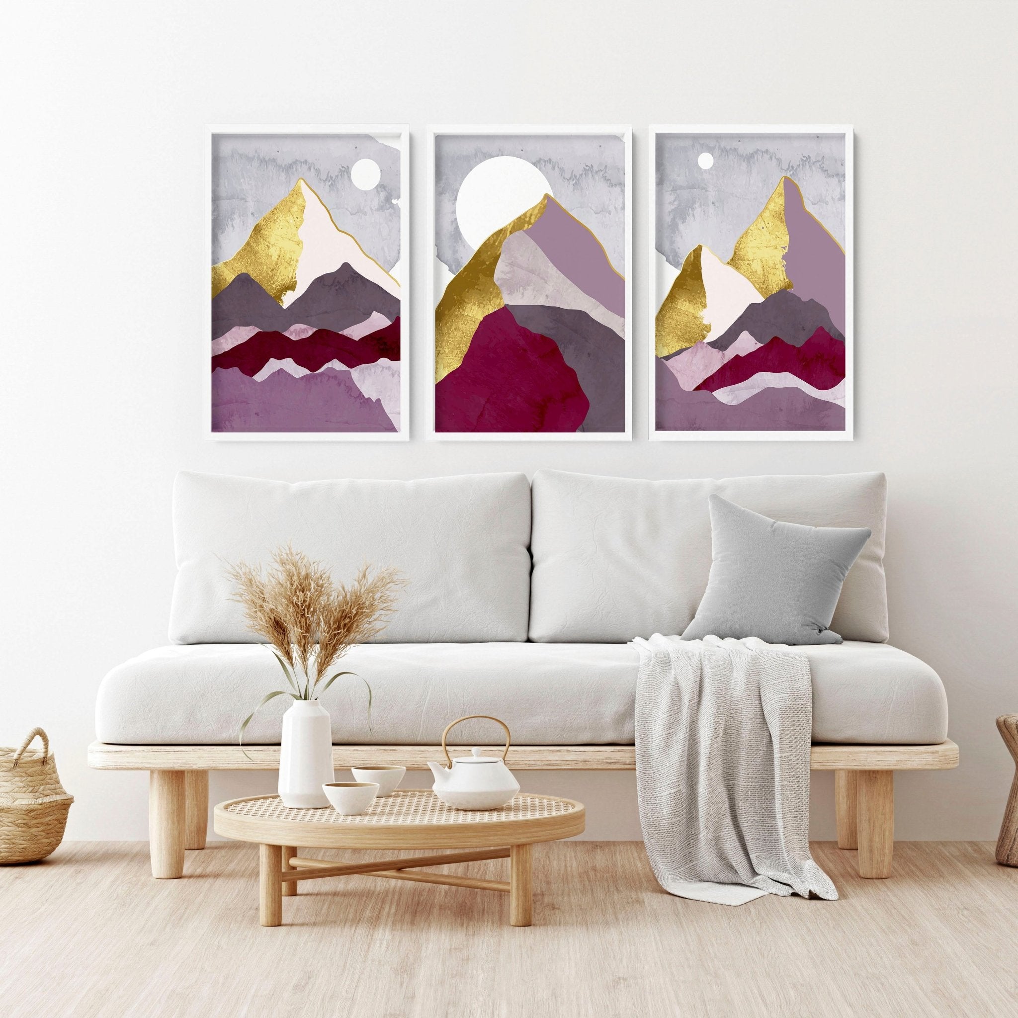 Set of 3 Scandinavian wall art prints featuring mountain landscapes in burgundy, lavender, and gold accents, perfect for living room decor.