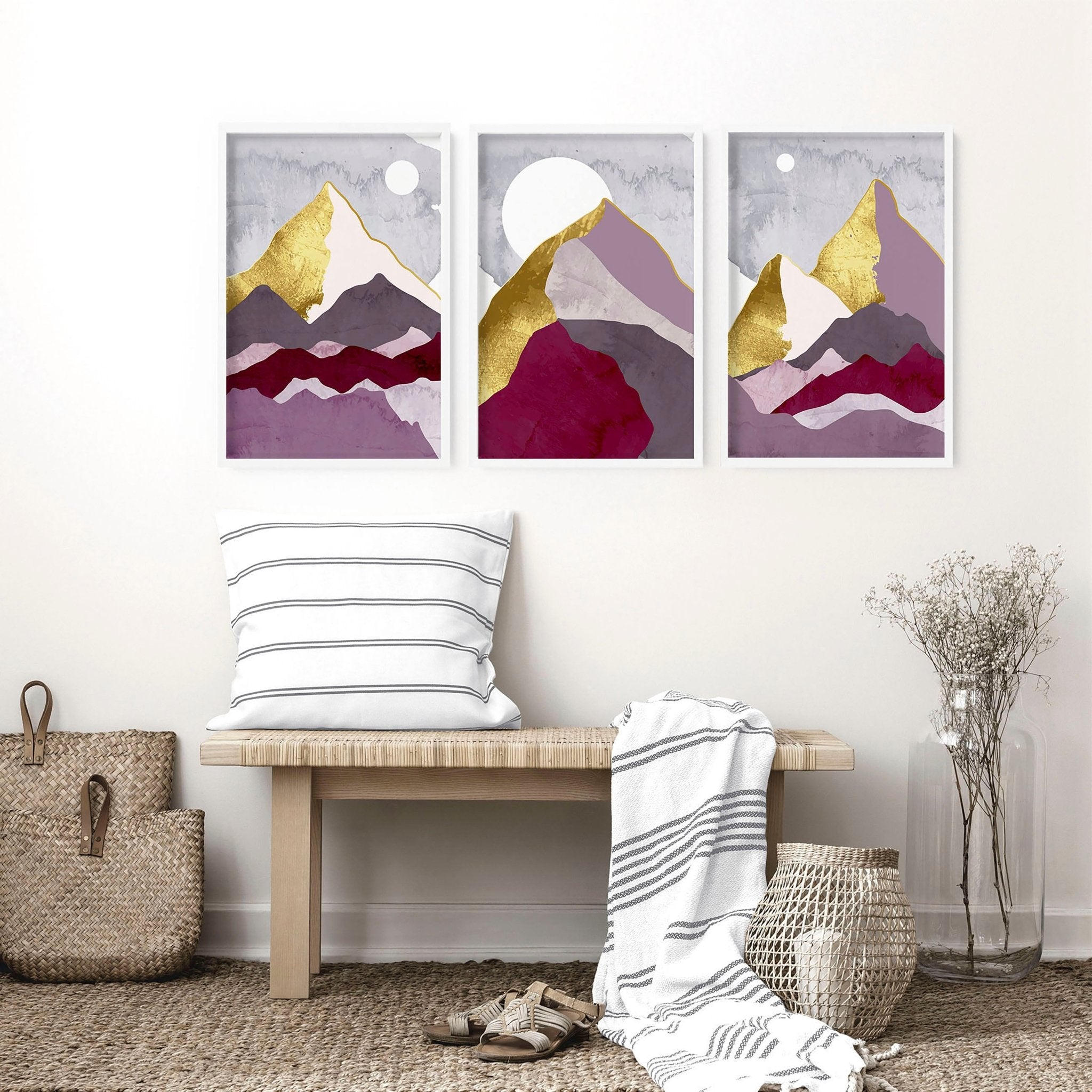 Set of 3 Scandinavian wall art prints featuring mountain landscapes in burgundy, lavender, and gold accents, perfect for living room decor.