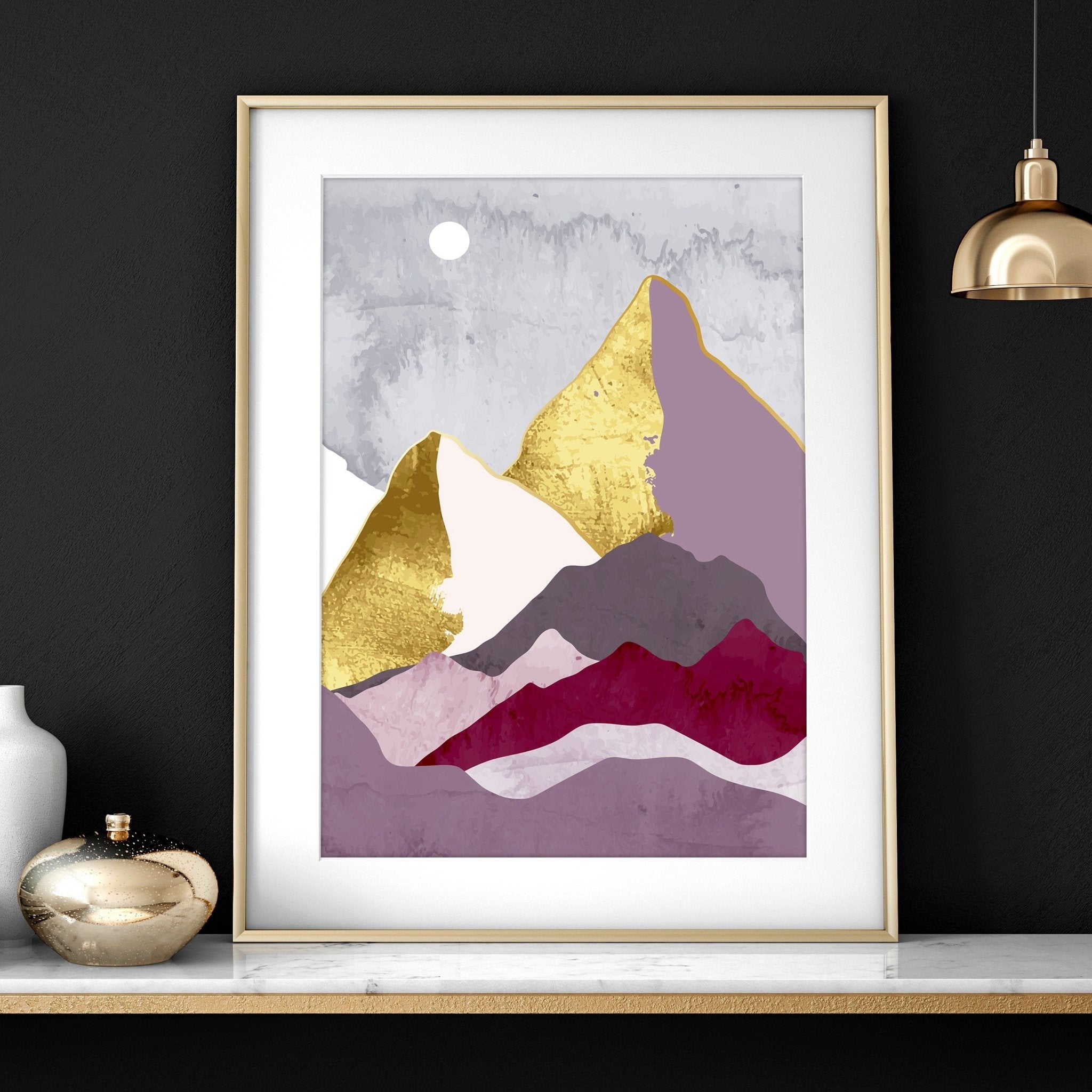 Set of 3 Scandinavian wall art prints featuring mountain landscapes in burgundy, lavender, and gold accents, perfect for living room decor.