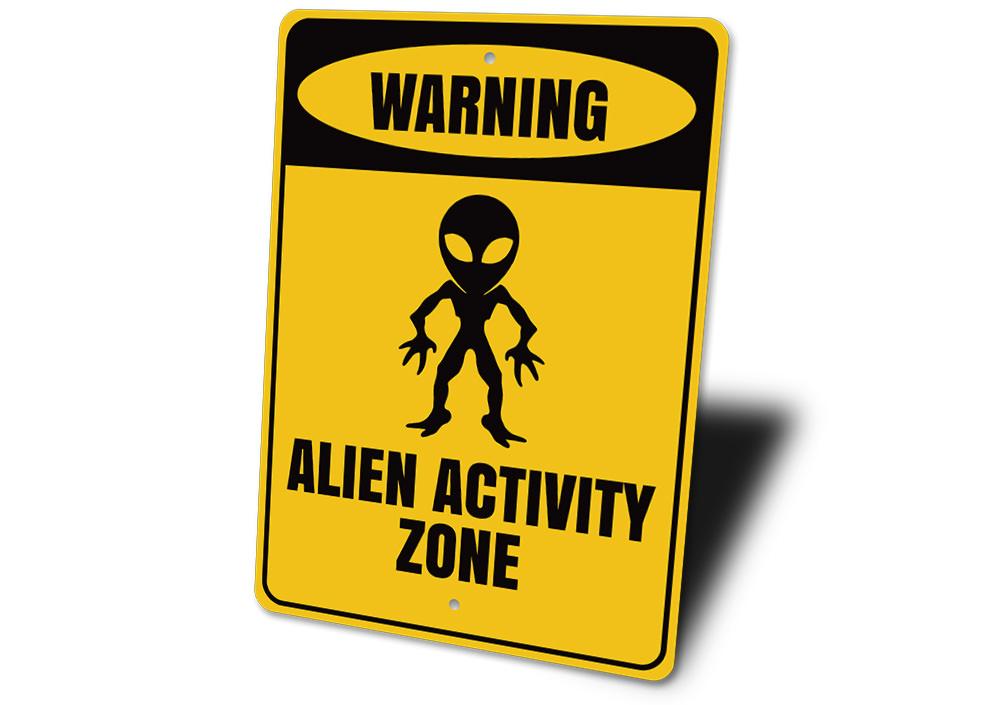 Warning Alien Activity Zone Sign made of durable aluminum, featuring vibrant colors and a playful design, perfect for kids' rooms.