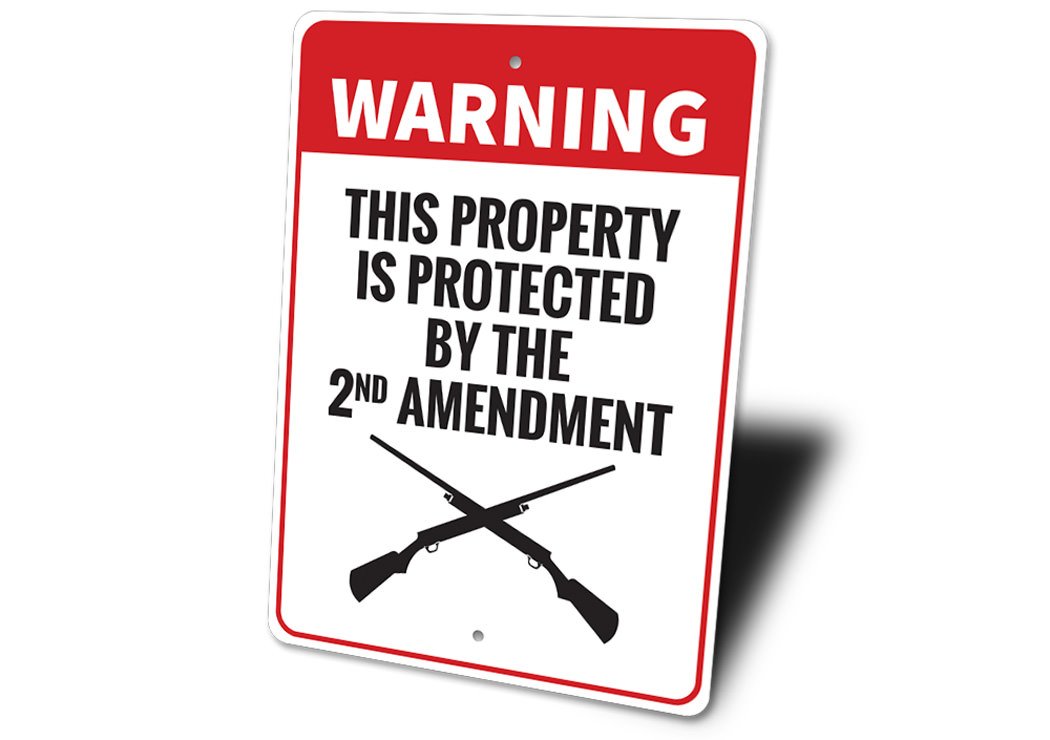 Warning Property Protected by 2nd Amendment Sign made of durable aluminum, featuring customizable text and pre-drilled holes for easy mounting.