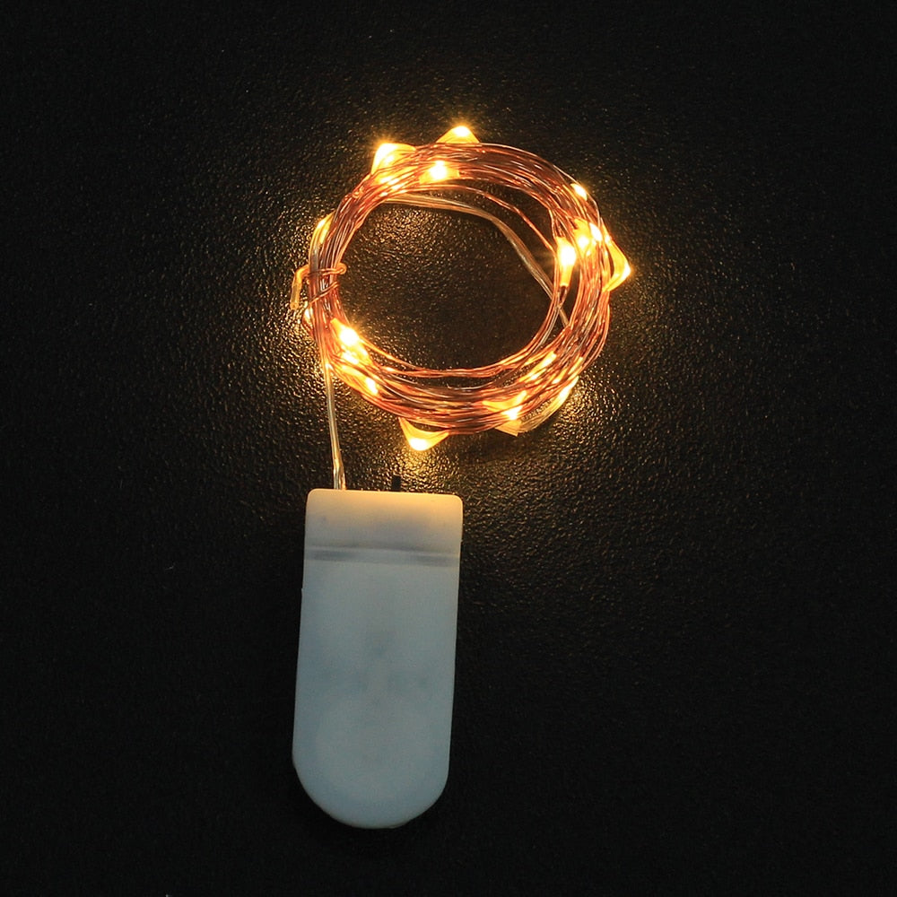Waterproof Fairy CR2032 Battery Powered LED Mini Christmas Decor with copper wire and multiple light colors, perfect for holiday decorations.