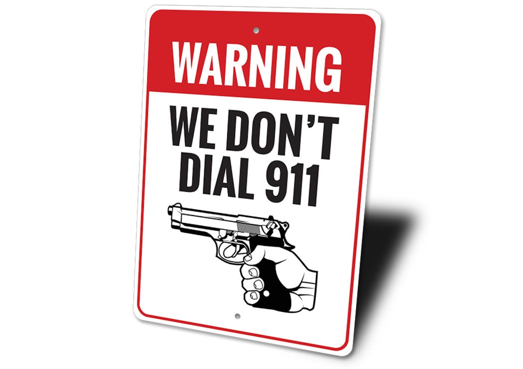 We Don't Dial 911 Warning Sign made from high-quality aluminum, featuring bold text and a decorative design, suitable for indoor and outdoor use.