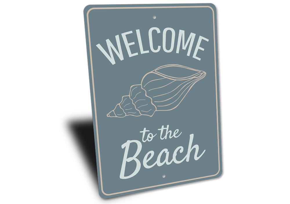 A decorative Welcome to the Beach Sign made of high-quality aluminum, featuring vibrant colors and a coastal design, perfect for beach houses.