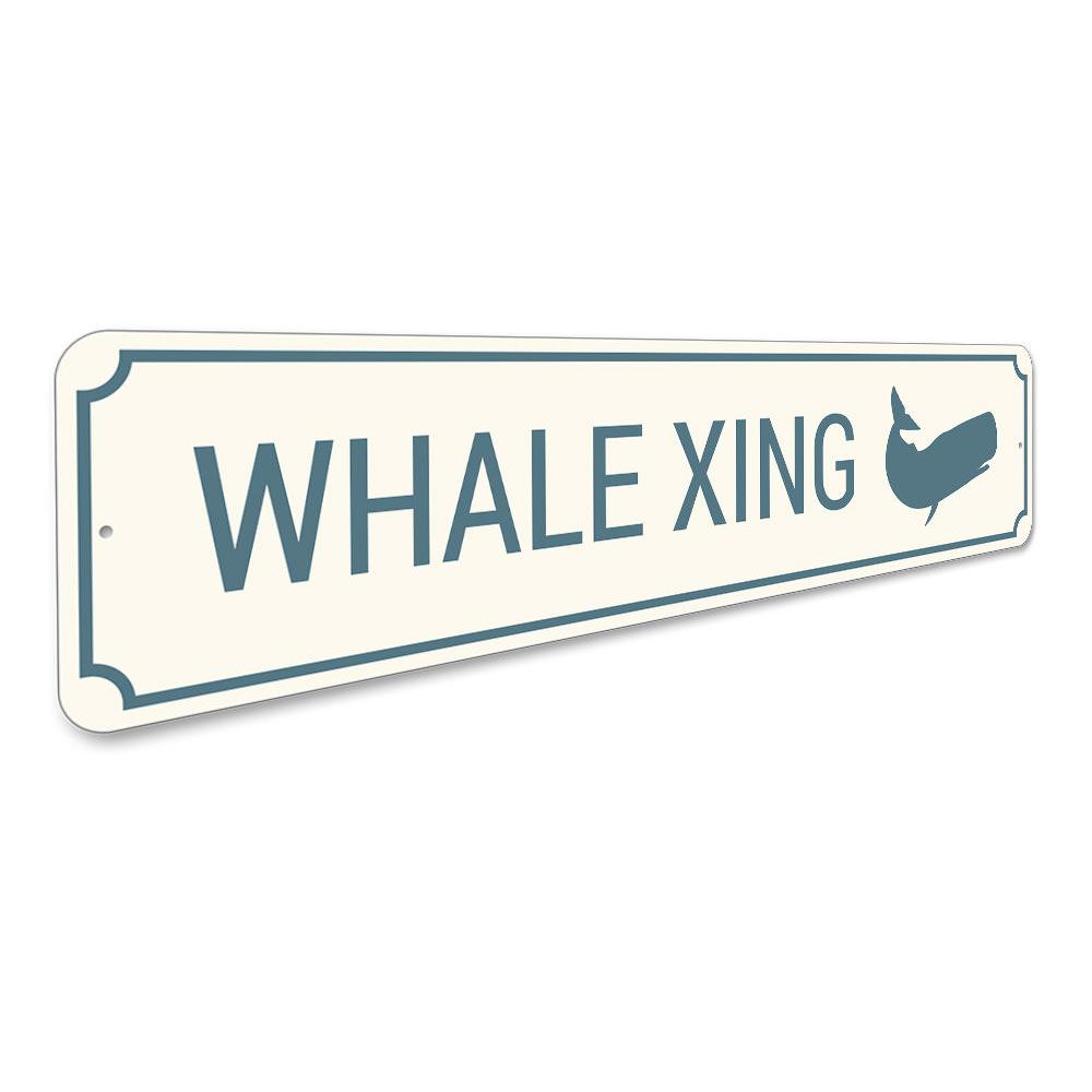 A decorative Whale Crossing Sign made of aluminum, featuring a vibrant design suitable for coastal decor.