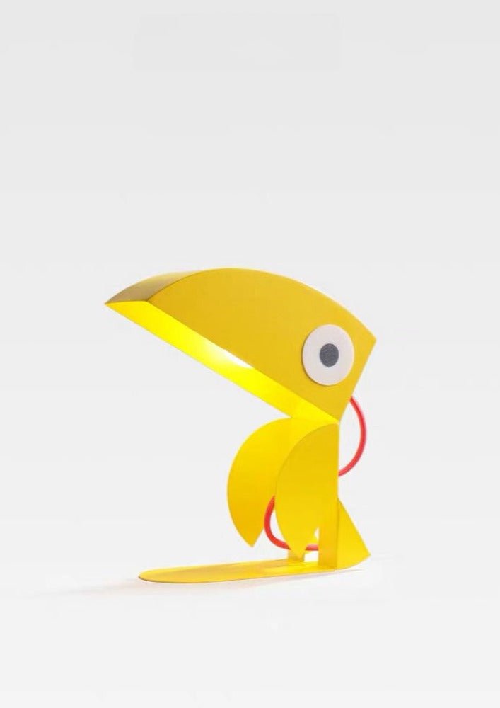 Whimsical Eclectic Memphis Cute Parrot Table Lamp featuring vibrant colors and a playful parrot design, ideal for study and bedside use.