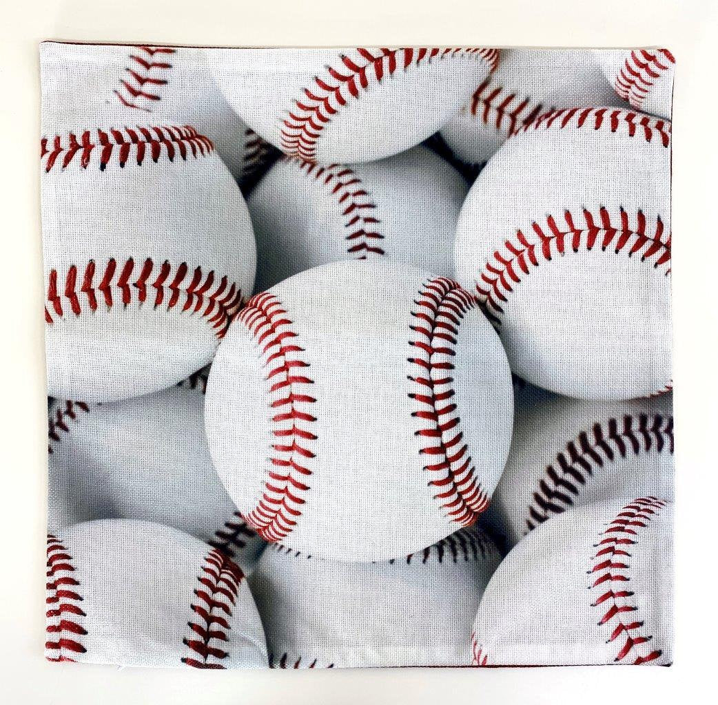A collection of White Baseballs pillow covers featuring vibrant baseball graphics on the front and a solid red back, showcasing quality craftsmanship.