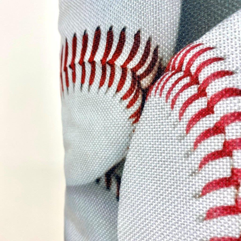 A collection of White Baseballs pillow covers featuring vibrant baseball graphics on the front and a solid red back, showcasing quality craftsmanship.