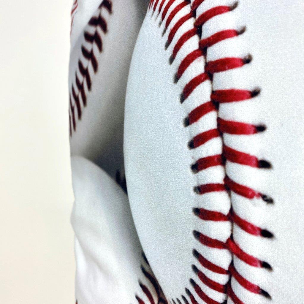 A collection of White Baseballs pillow covers featuring vibrant baseball graphics on the front and a solid red back, showcasing quality craftsmanship.