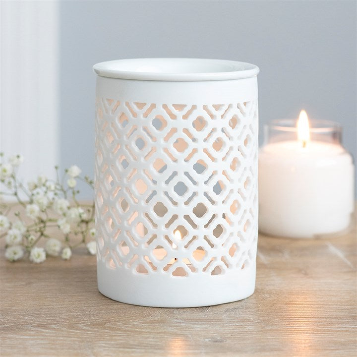 White matte lattice cut oil and wax melt tealight burner with elegant design and warm glow.